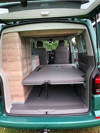 V interior from the back door bed